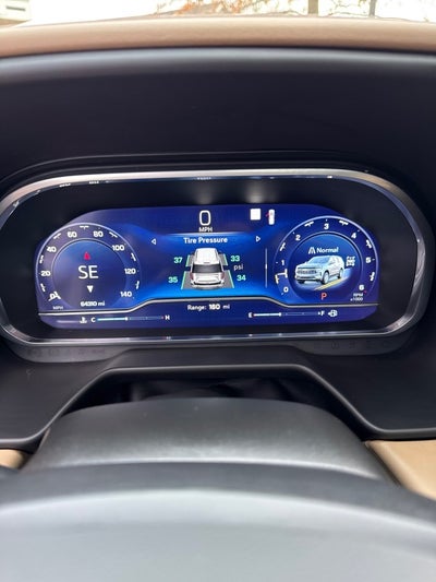 2023 Chevrolet Suburban Premier with Center Buckets and Sunroof in Iridescent Pearl Tintcoat